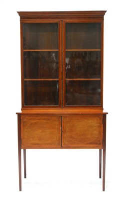 Lot 655 - An Edwardian inlaid mahogany display cabinet