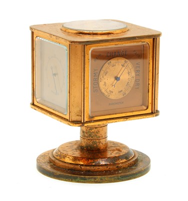 Lot 431 - A coppered five dial swivel table compendium