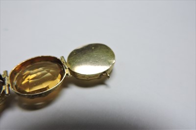 Lot 40 - A Victorian gold graduated citrine bracelet