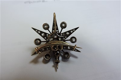 Lot 66 - A Victorian diamond set star brooch