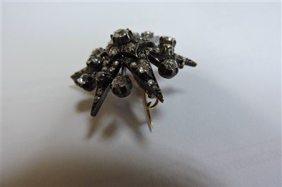 Lot 66 - A Victorian diamond set star brooch