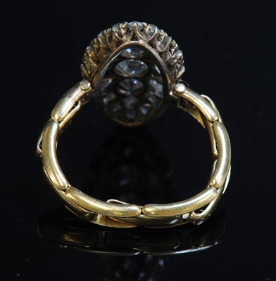 Lot 74 - A late Victorian diamond set marquise shaped cluster ring, c.1900