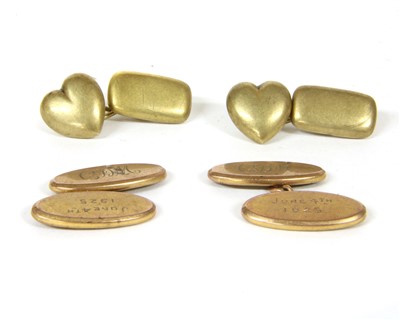 Lot 42 - A pair of 15ct gold hollow heart and cushion shaped cufflinks