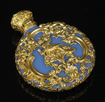 Lot 18 - A Victorian Rococo Revival blue glass, gold mounted scent bottle