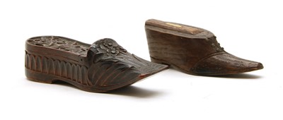 Lot 287 - Two carved wooden shoe shaped boxes