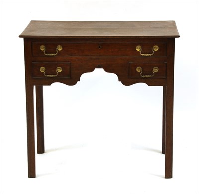 Lot 629 - A George III oak side table