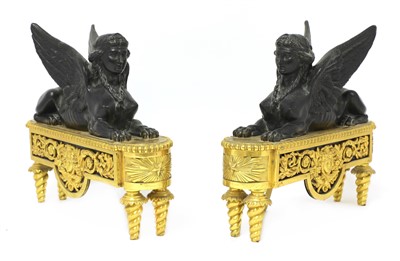 Lot 695 - A pair of bronze chenets