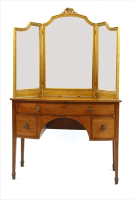 Lot 714 - A 19th century bow front dressing table