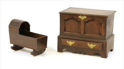 Lot 543 - A miniature oak mule chest