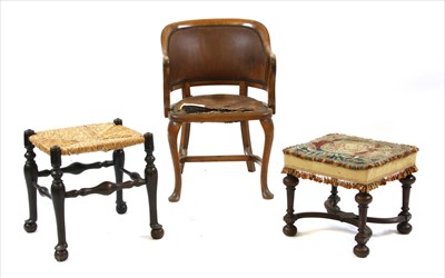 Lot 712A - An oak elbow chair and two stools (3)