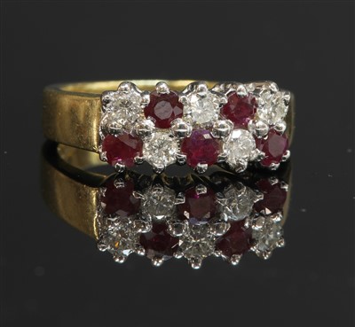 Lot 90 - An 18ct gold two row ruby and diamond ring