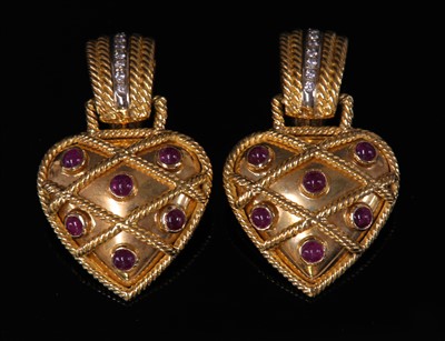Lot 353 - A pair of Italian gold ruby and diamond heart-shaped drop earrings, c.1980