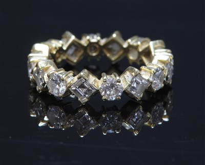 Lot 374 - An 18ct gold diamond set full eternity ring
