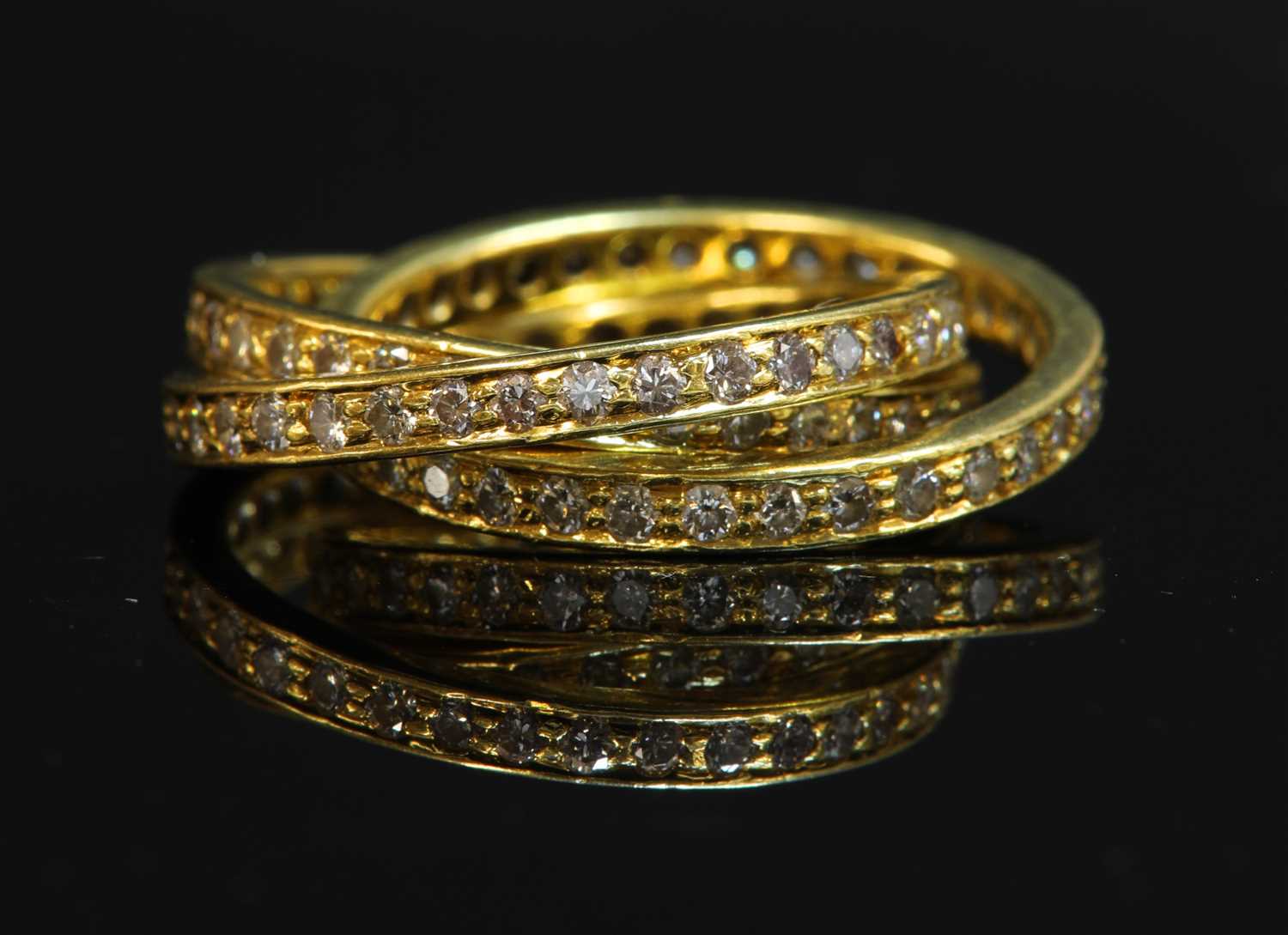 Lot 314 - A gold diamond set Russian wedding ring