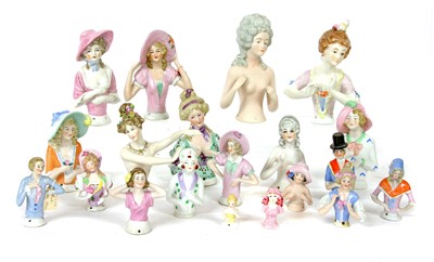 Lot 454 - Twenty china pin cushion dolls