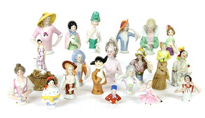 Lot 453 - Twenty china pin cushion dolls