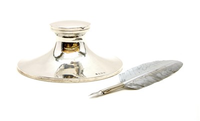 Lot 198 - A silver capstan inkwell