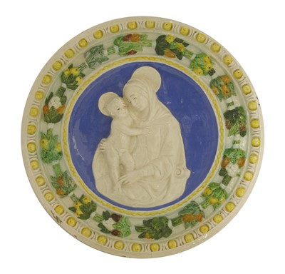 Lot 524 - A Della Robbia pottery Madonna and Child tondo