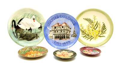 Lot 493 - A collection of modern Moorcroft plates and coasters