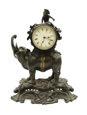 Lot 522 - A late 19th century French bronze mantel clock