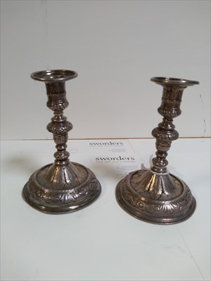Lot 9 - A pair of silver taper sticks