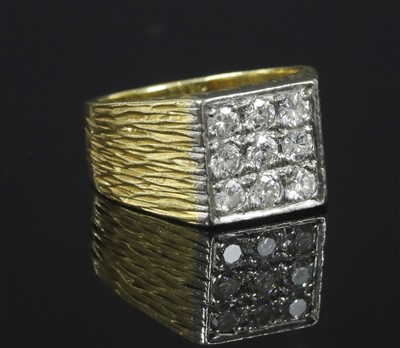 Lot 148 - A gentlemen's two colour gold diamond set ring