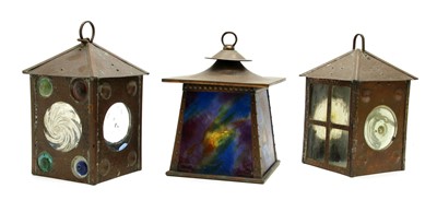 Lot 460 - An Arts and Crafts copper lantern with multicoloured glazed panels