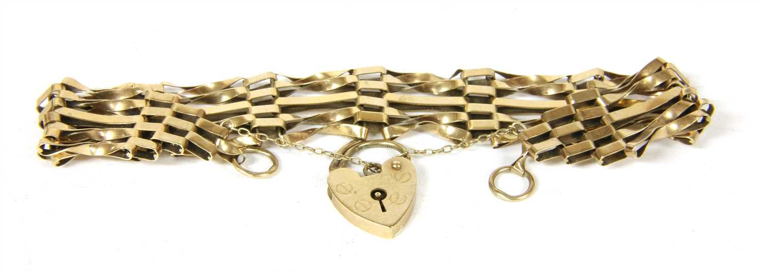 Lot 264 - A 9ct gold five row gate bracelet