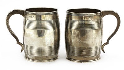 Lot 4 - A pair of George III silver mugs