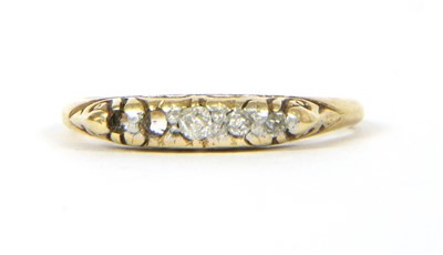 Lot 57 - A five stone diamond boat shaped ring