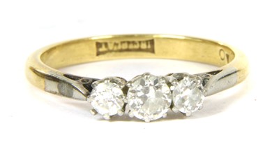 Lot 75 - A three stone diamond ring