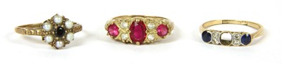 Lot 84 - A gold sapphire and diamond seven stone ring
