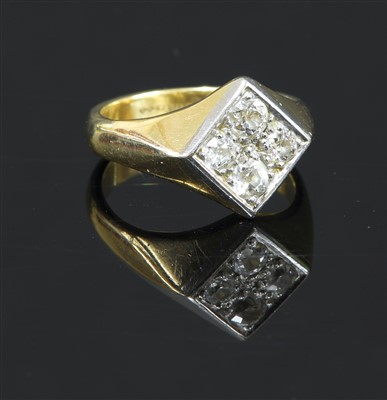 Lot 142 - A 9ct gold four stone diamond offset square signet ring