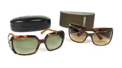 Lot 227 - A pair of Versace sunglasses and Carolina Herrera sun glasses