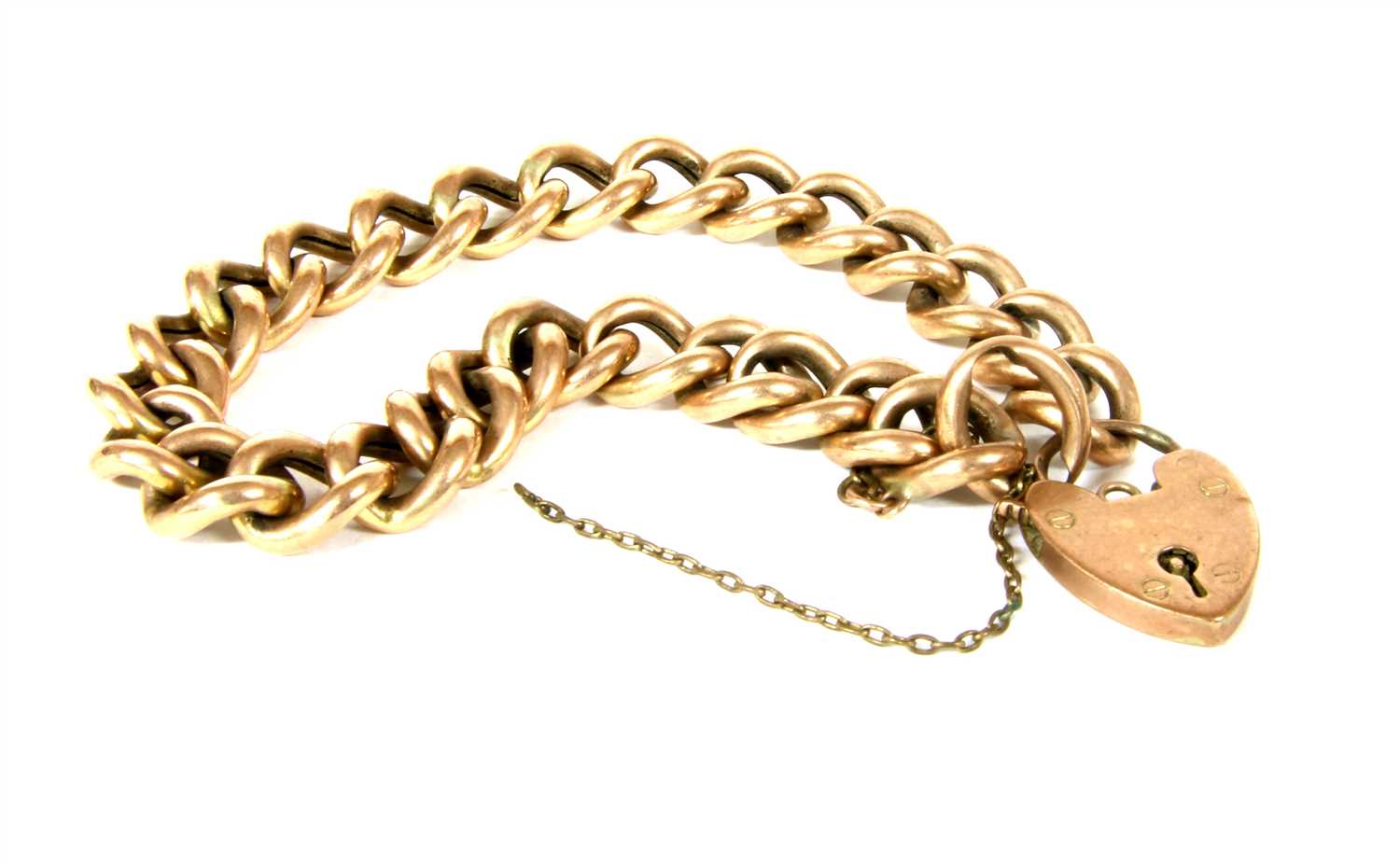 Lot 16 - A hollow curb link bracelet with heart padlock clasp