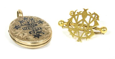 Lot 13 - A front and back memorial locket
