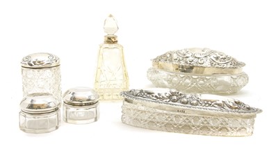 Lot 271 - An Edward VII hallmarked silver and cut glass lidded dressing table dish
