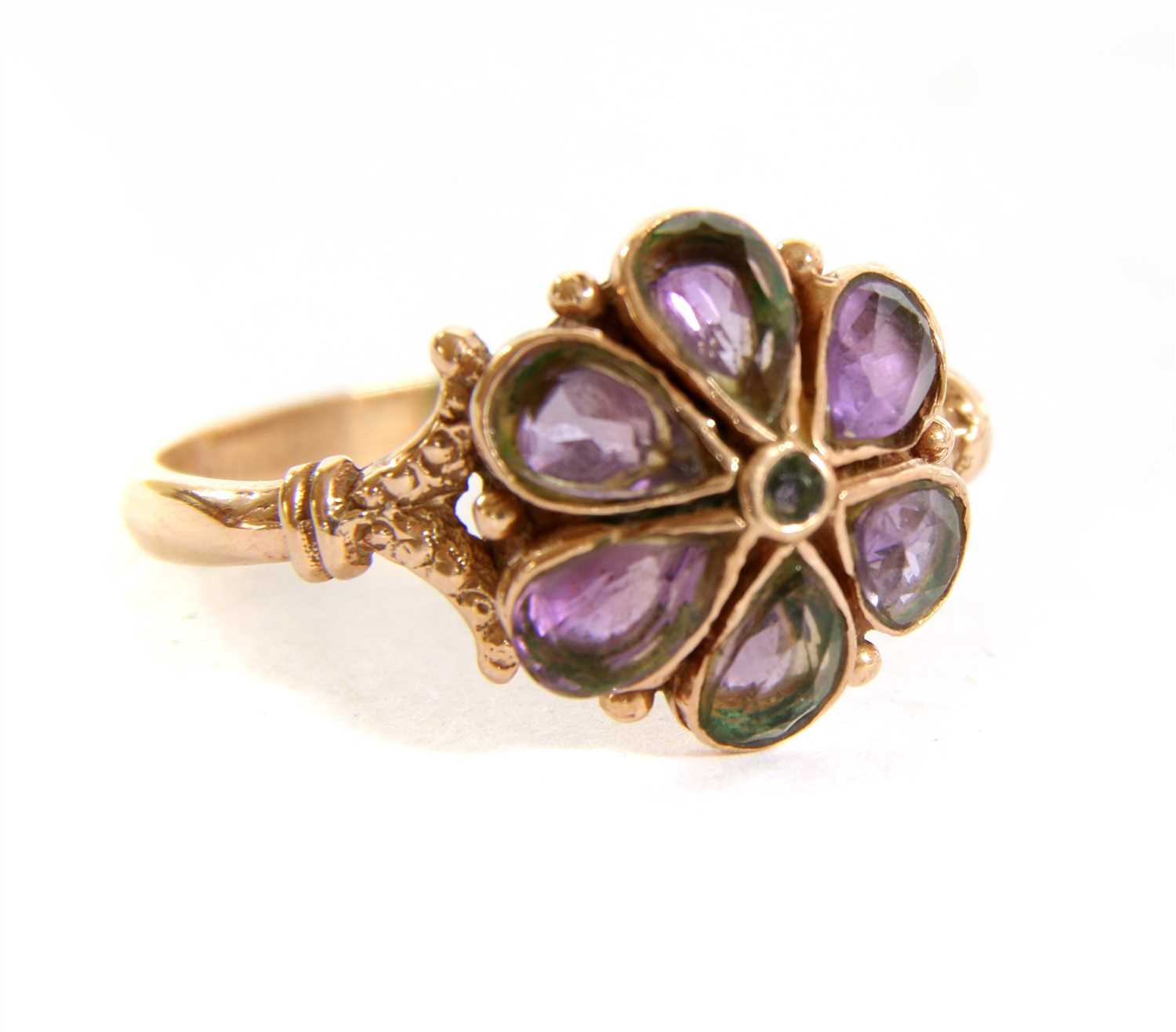 Lot 119 - A rose gold amethyst flowerhead cluster ring