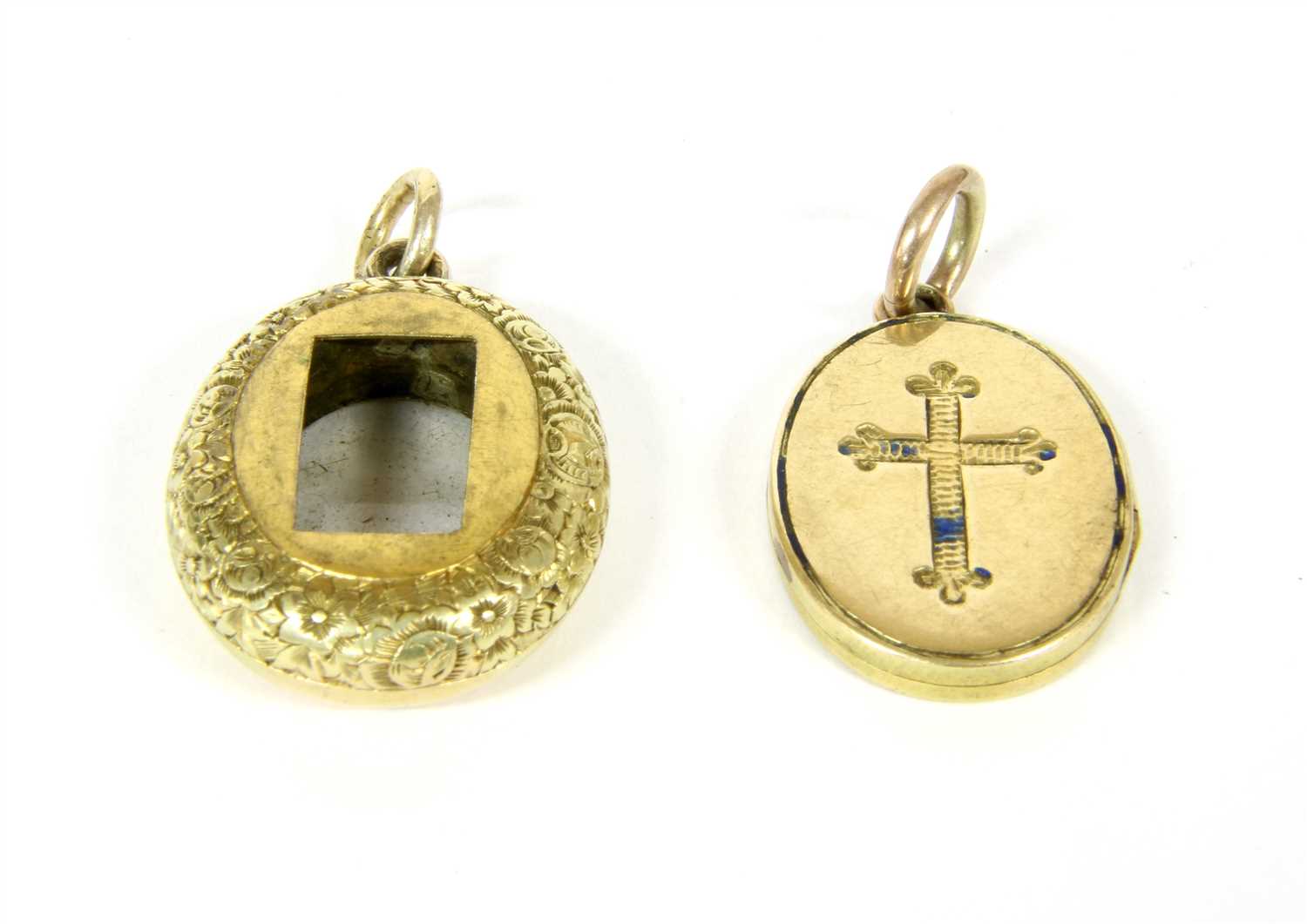 Lot 15 - A gold enamel oval locket