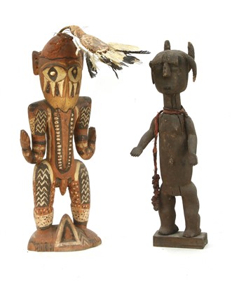 Lot 540B - Two large carved and painted West African figures