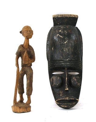 Lot 511 - A large West African carved mask