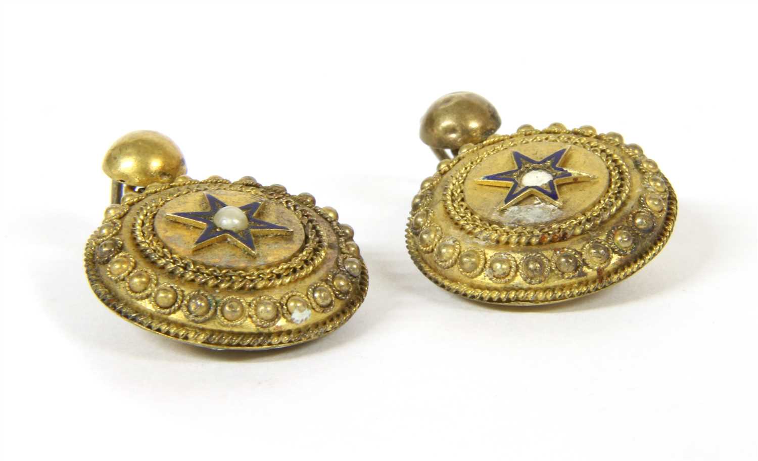 Lot 18 - A pair of hollow shield form Etruscan revival earrings