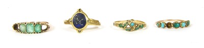 Lot 52 - A gold five stone emerald cut emerald ring