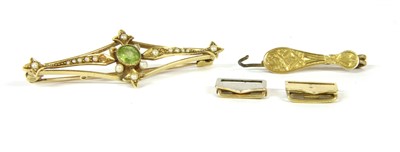 Lot 1 - An Edwardian peridot and seed pearl bar brooch