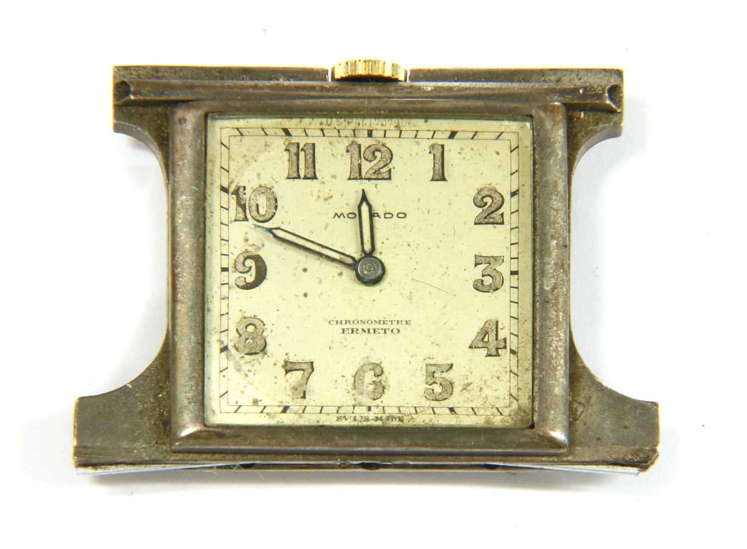 Lot 121 - A sterling silver mechanical Movado purse watch movement