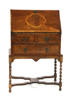 Lot 632 - A late 19th century inlaid walnut miniature bureau