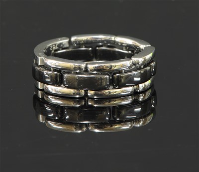 Lot 537 - An 18ct white gold and black ceramic Chanel J12 Ultra ring