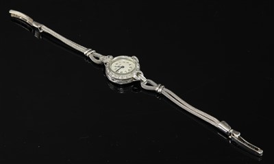 Lot 192 - A ladies' Art Deco platinum diamond set mechanical cocktail watch