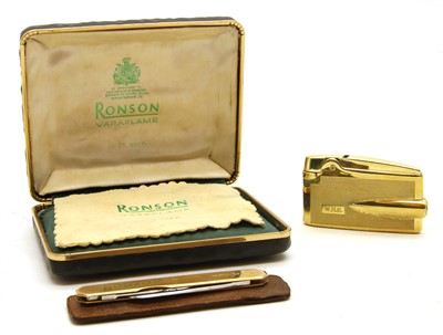 Lot 263 - A Ronson 14ct gold Varaflame lighter