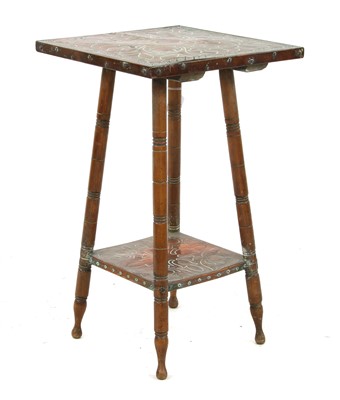 Lot 684 - An Arts and Crafts two tier occasional table